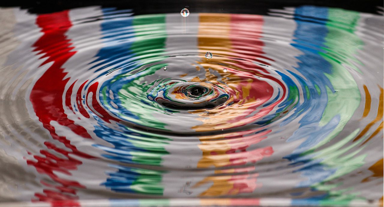 Colorful drop in a pool