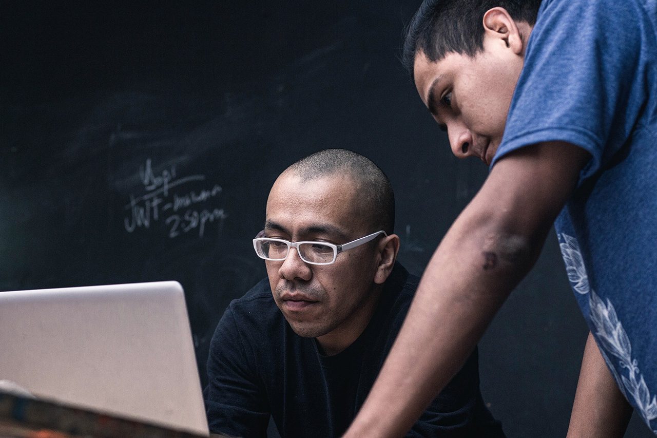 Men at computer