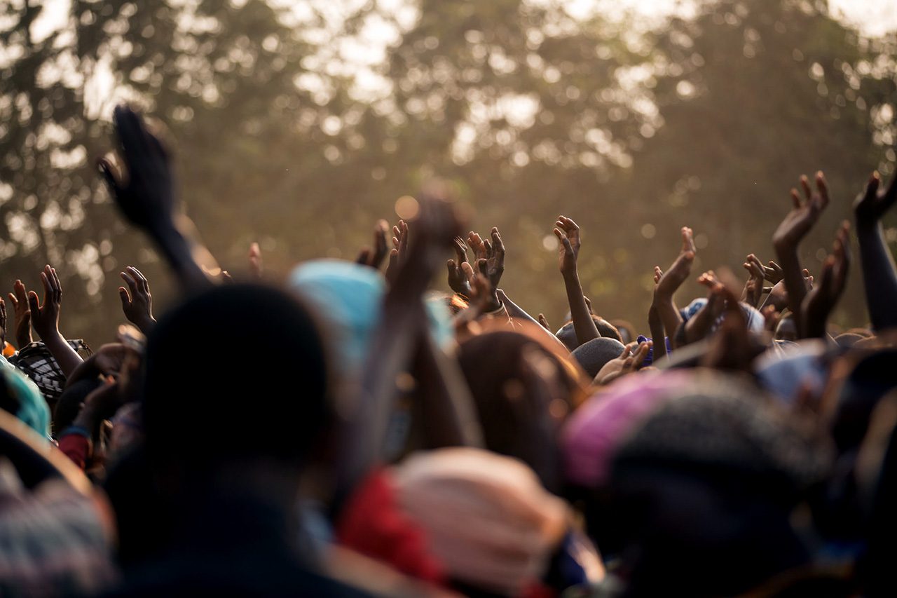 Hands raised in crowd