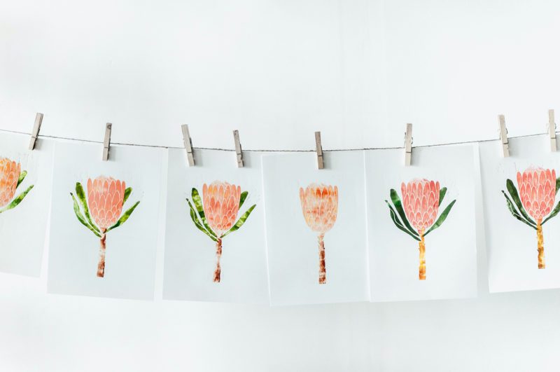 Flower drawings on clothesline