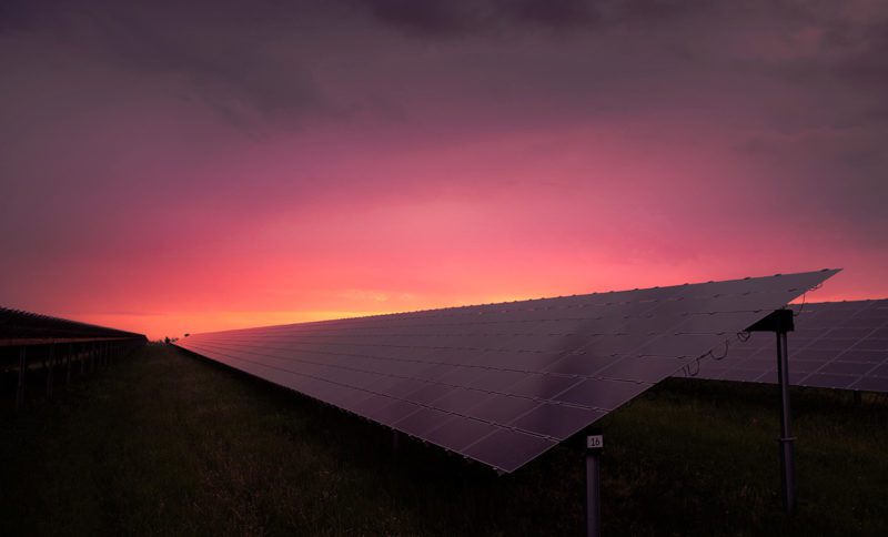 Sunset over solar panel