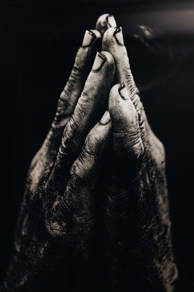 Hands folded in prayer
