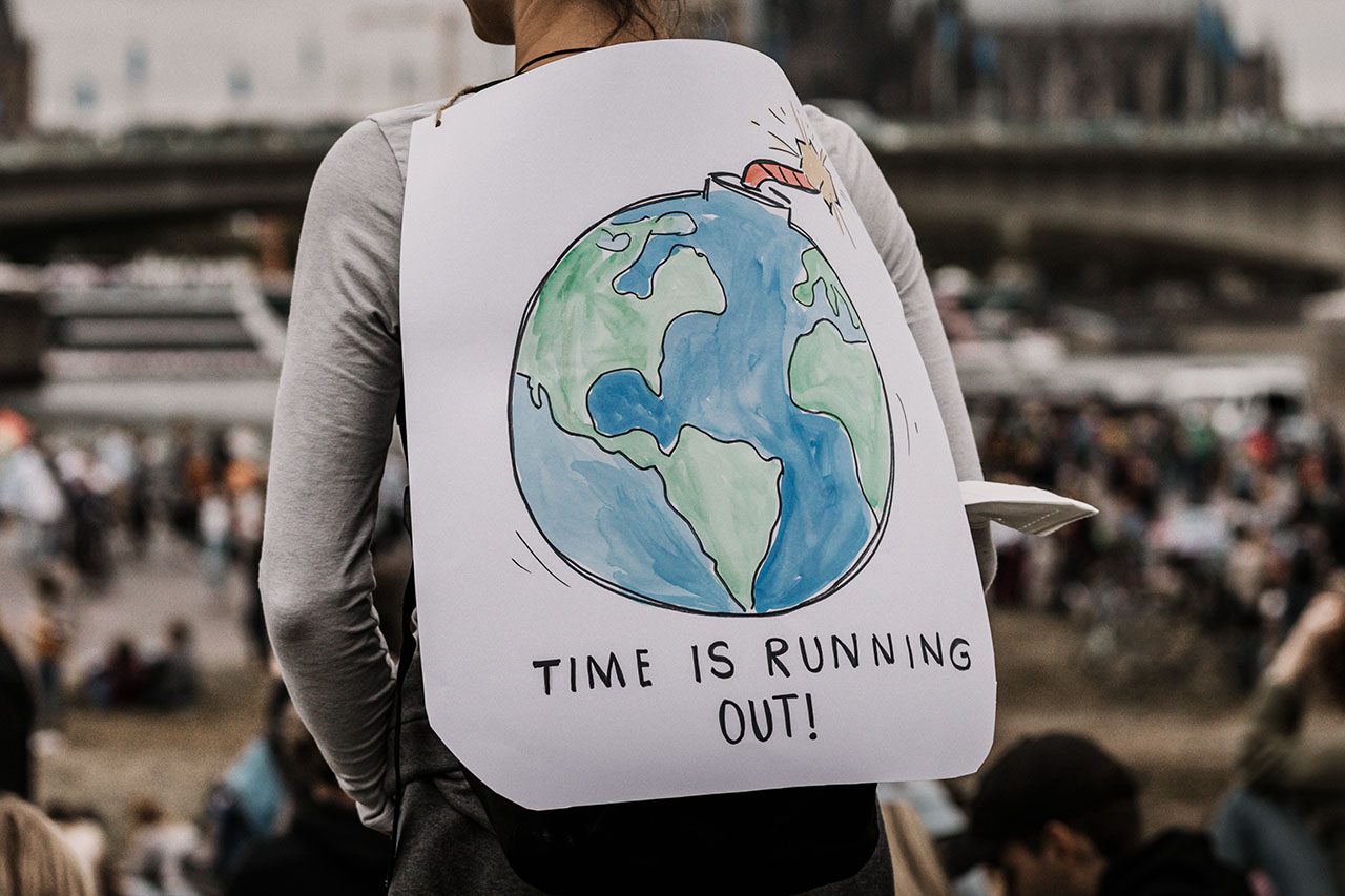Time is running out protest sign