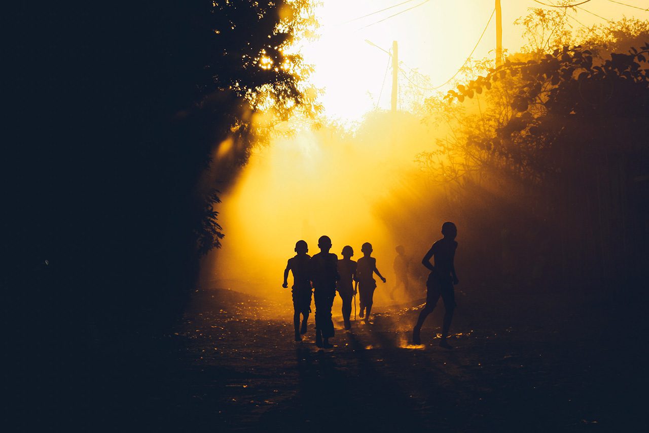 Boys running in Africa