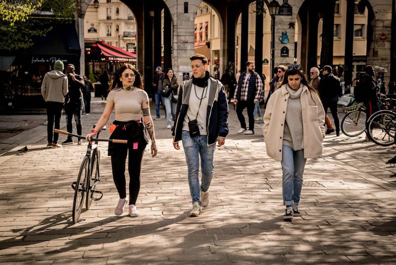 Three youths walking in Paris