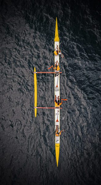 Rowers in boat