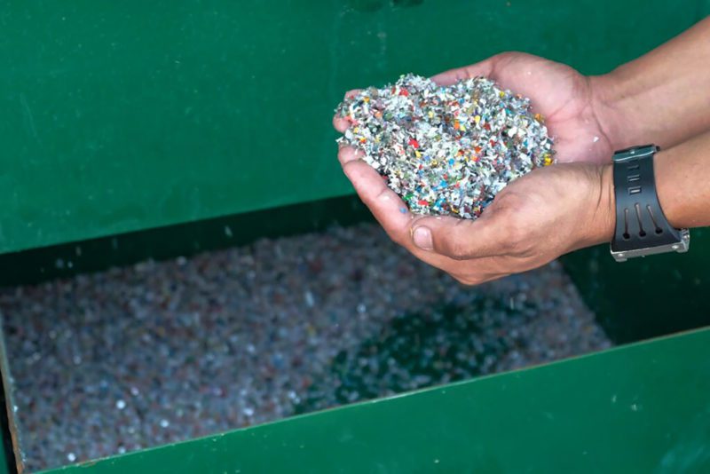 Plastic waste in cupped hands