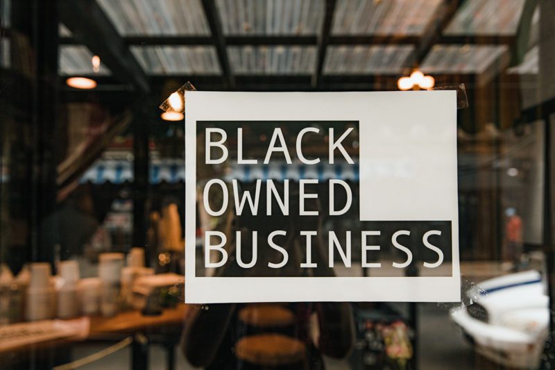 Office with Black Owned Business Sign