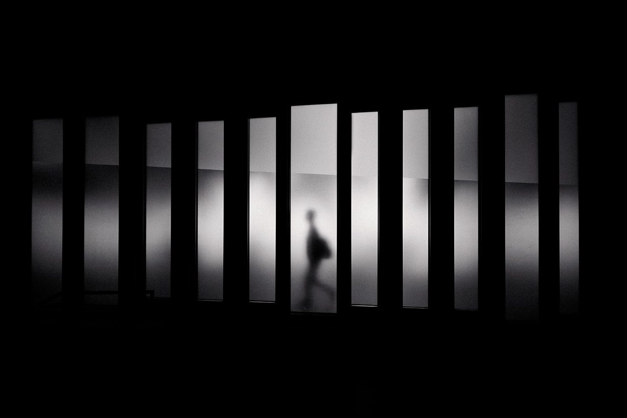 Man walking through abstract landscape