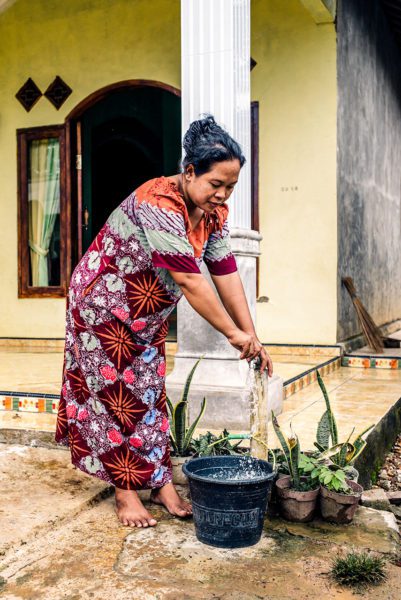 Woman washing outside