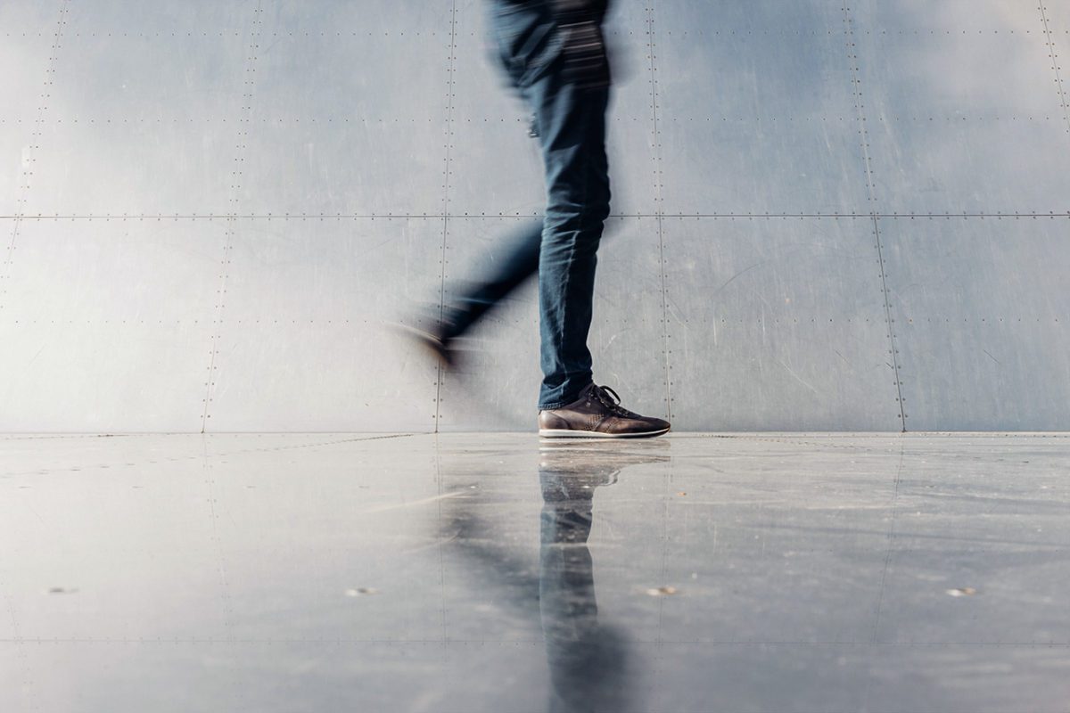 Legs of man walking