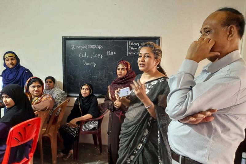 The author meeting women from Surovi's computer literacy program in Bangladesh, an organization that is supported by the IIX Foundation.