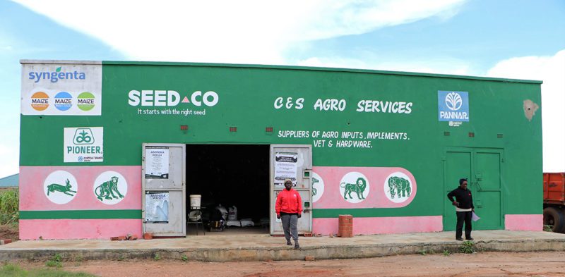 Salima Lungu Nosiku in front of her business