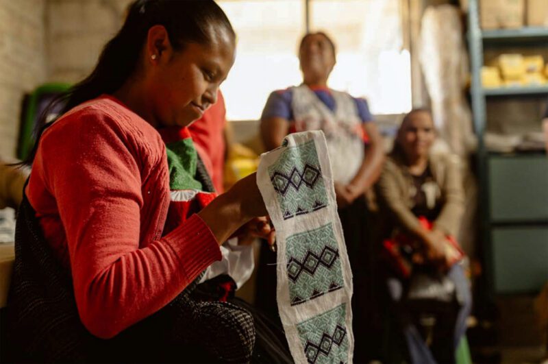 Mexican female artisan weaving