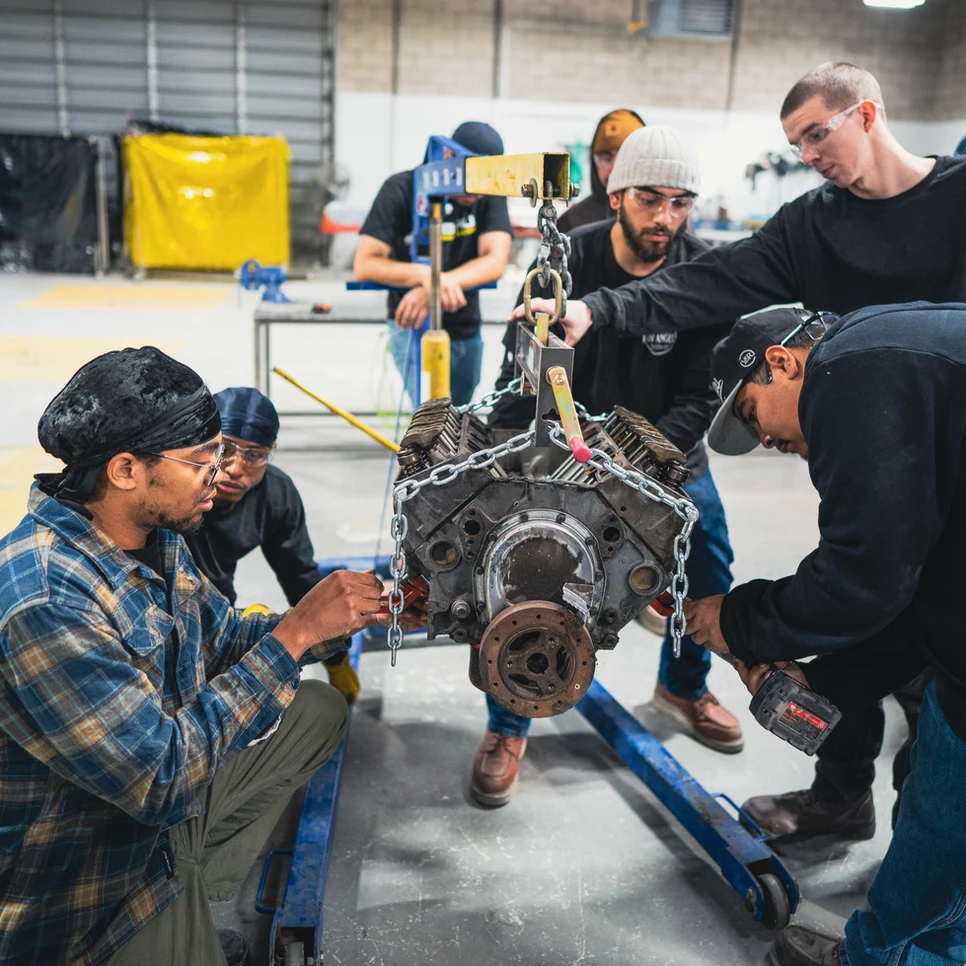 Workers collaborating of fixing engine