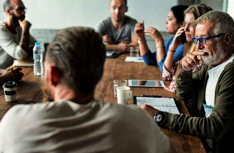 Business meeting around conference table