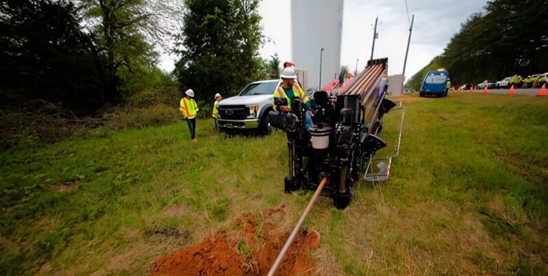 Trenching for conduit and fiber placement