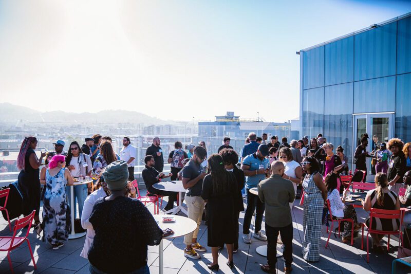Conference participants networking in outdoor space