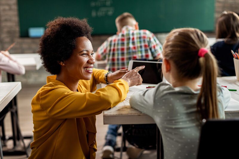 Teacher and student in classroom