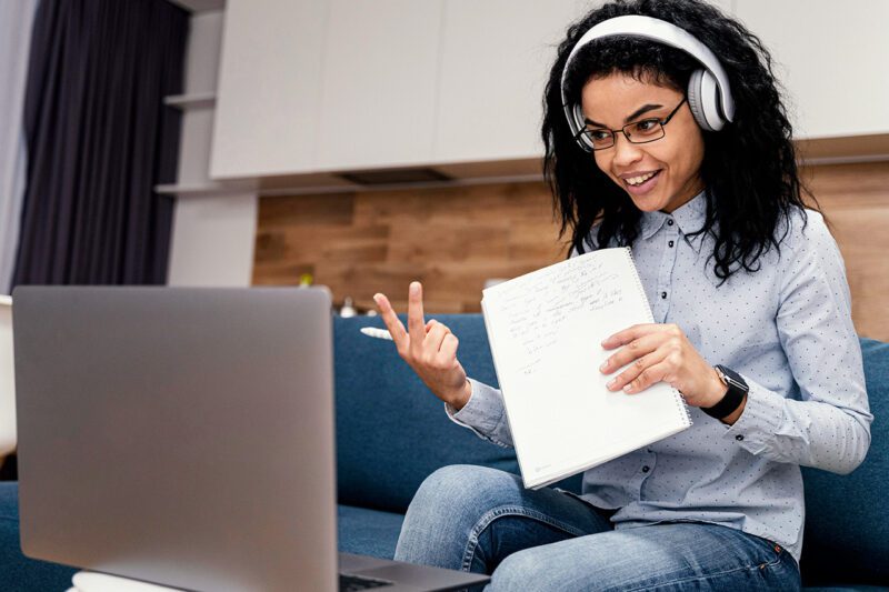 Student in front of computer doing remote learning