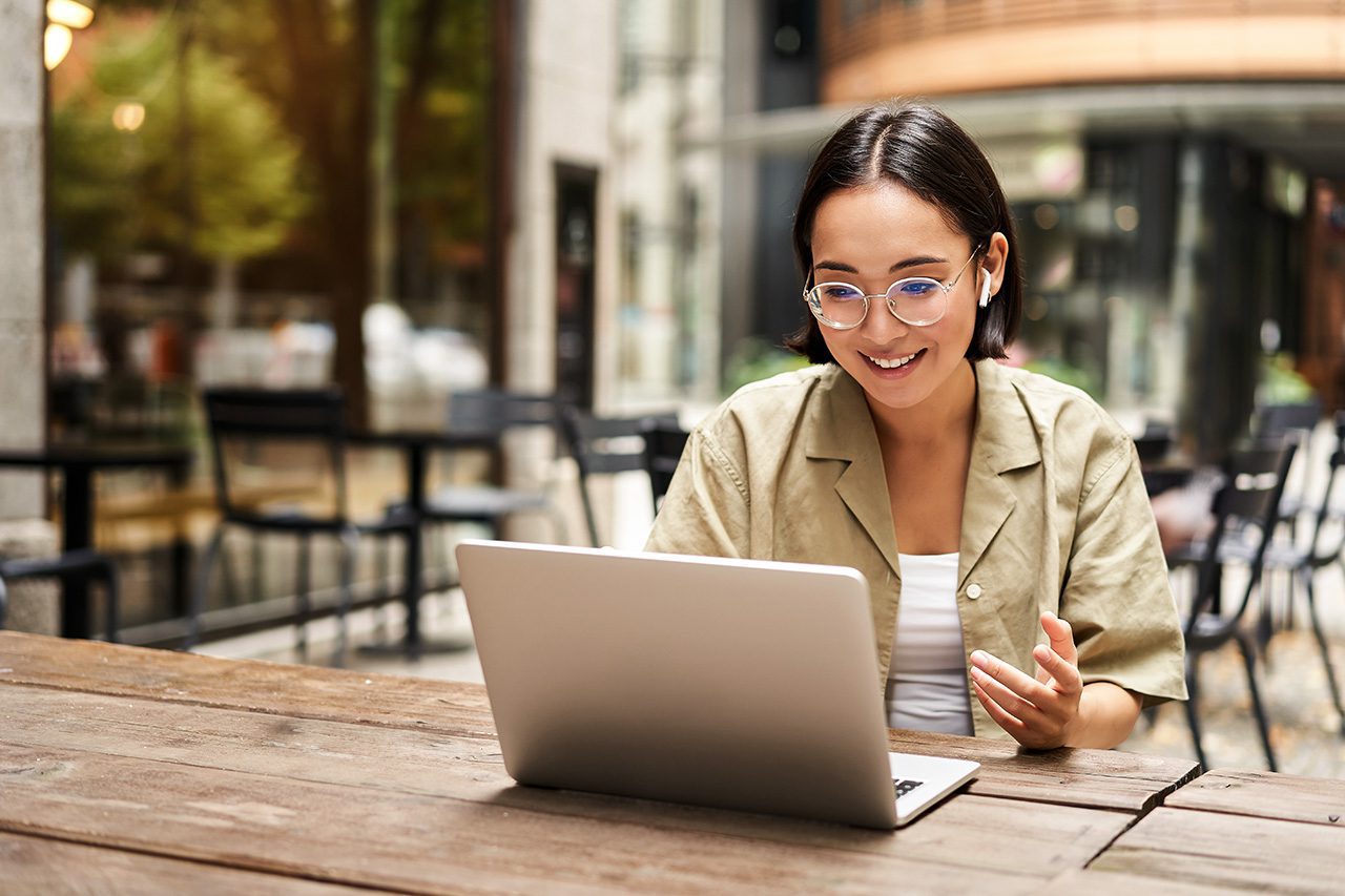 Asian woman on computer