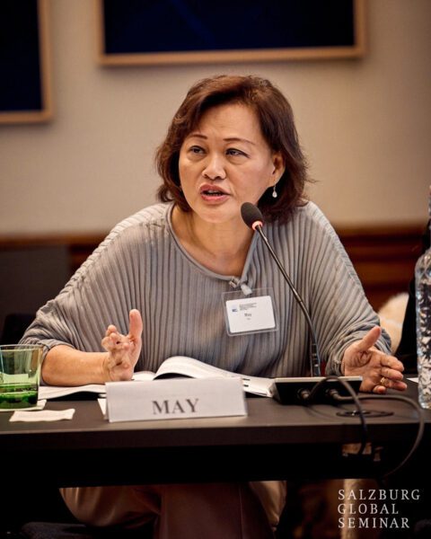 May Tan speaking at a conference