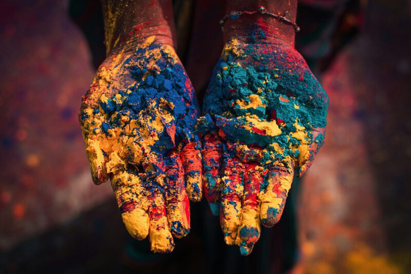 Two paint splattered hands