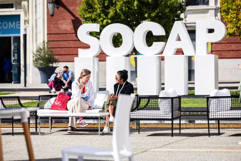 Two women meeting at SOCAP 2024