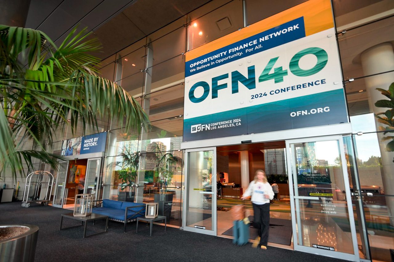 OFN 40 Conference banner in front of building