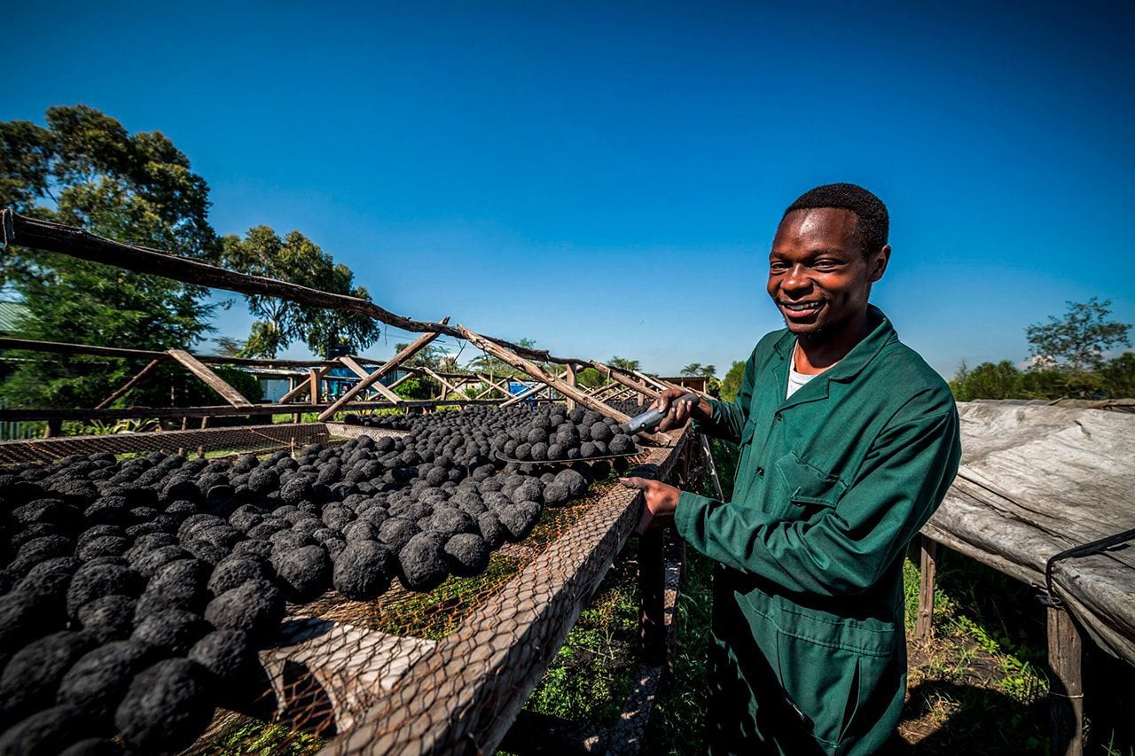 Kenyan farmer with produce
