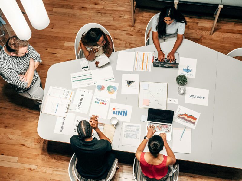 Professionals working at conference table