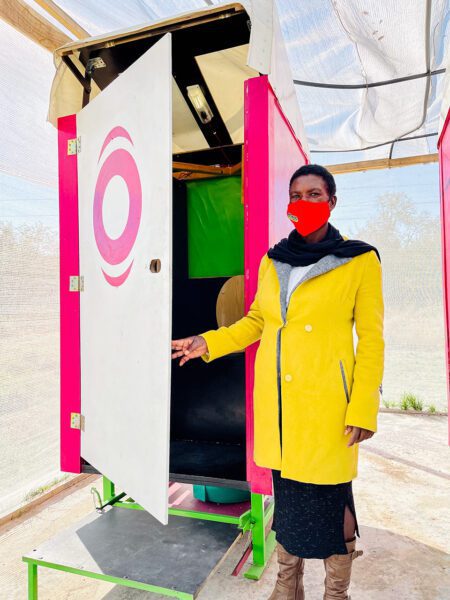 Nambian woman at Flushh toilet