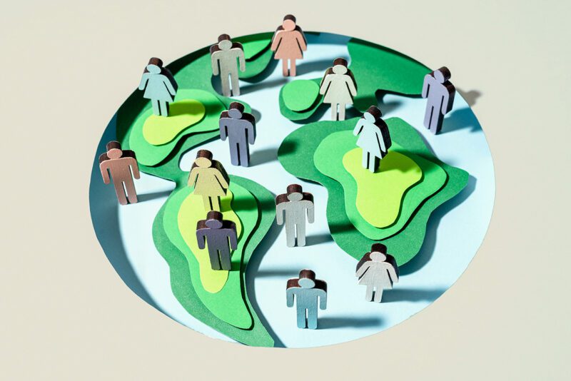 Collage of people and global land masses