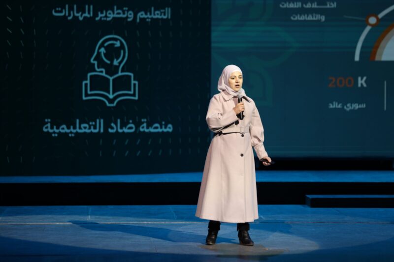 Syrian entrepreneur on stage