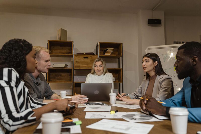 Employees at conference table