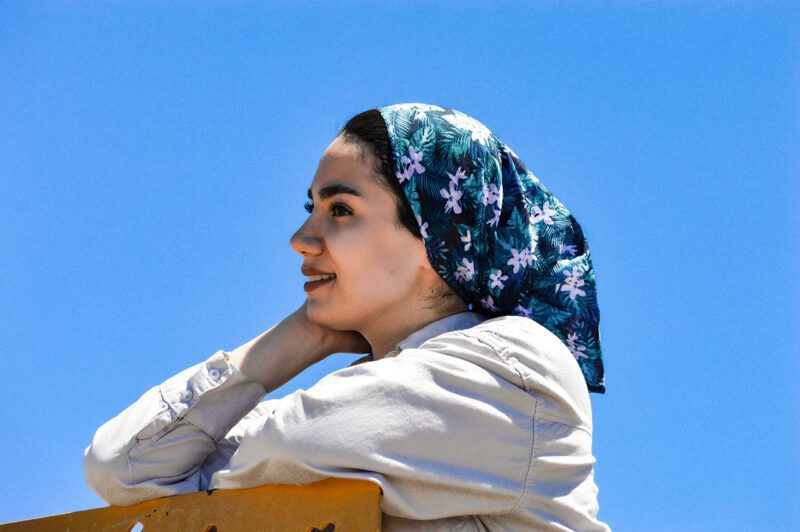 Middle Eastern Youth in scarf