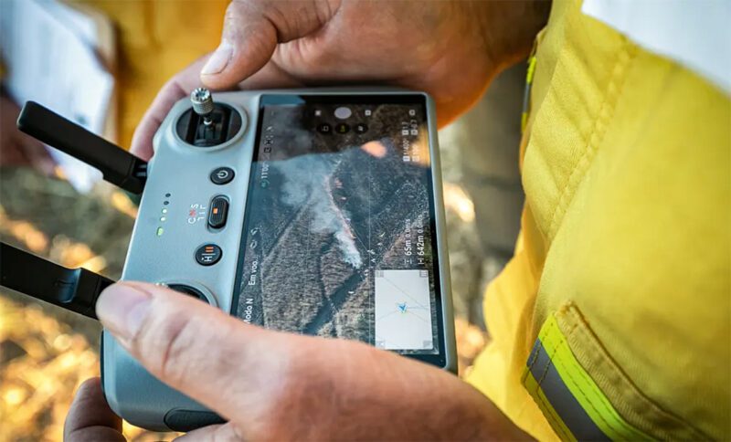 Firefighter with drone controller