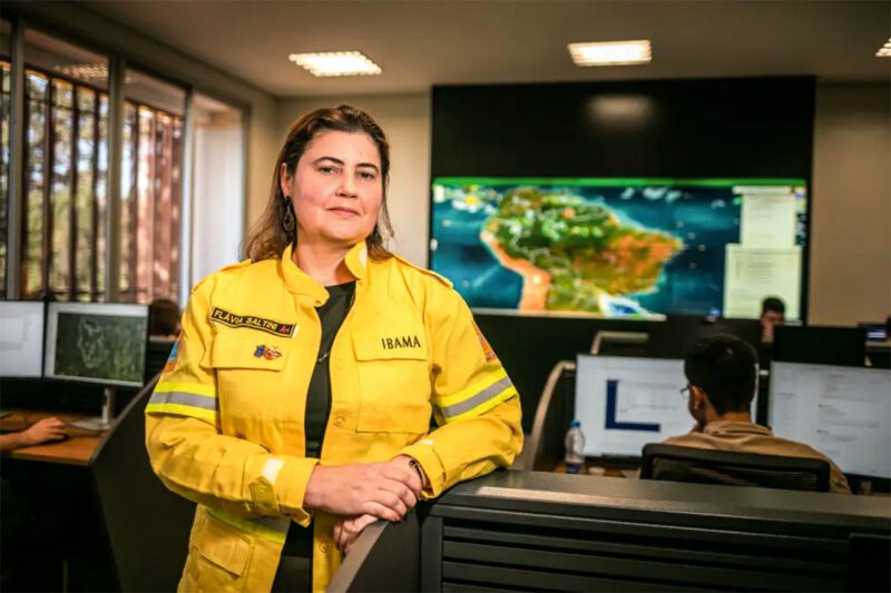 Female firefighter in monitoring room