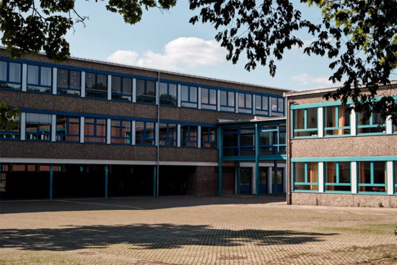 School building in shadows