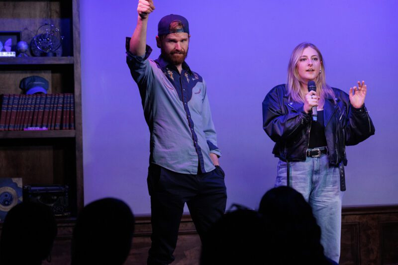 Man and woman performers on stage