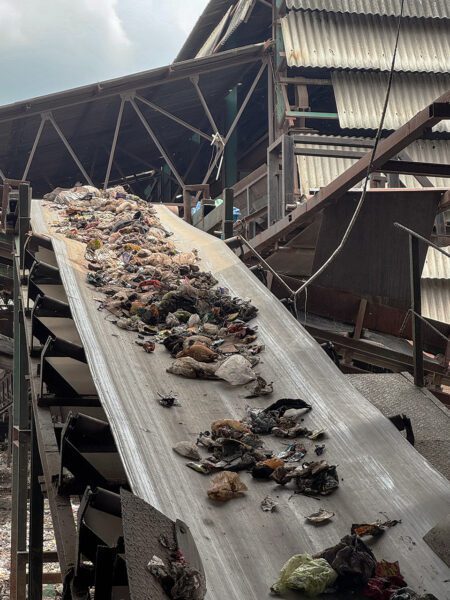 Waste on trommel machine