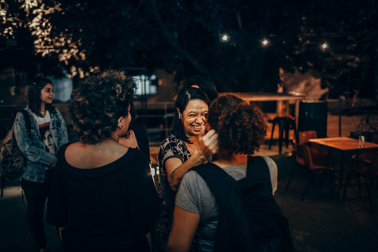 Smiling people gathering