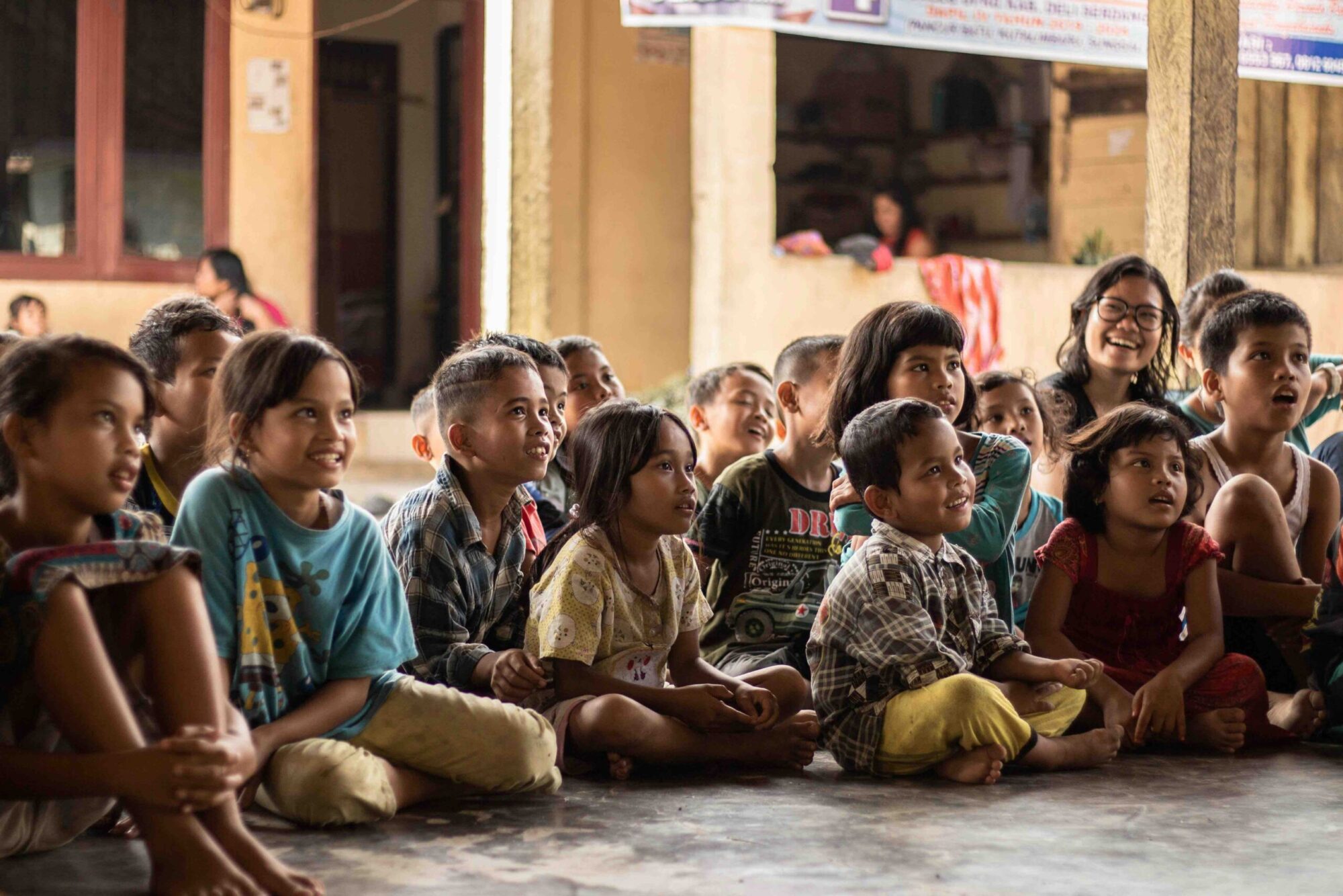 Group of children sitting on ground