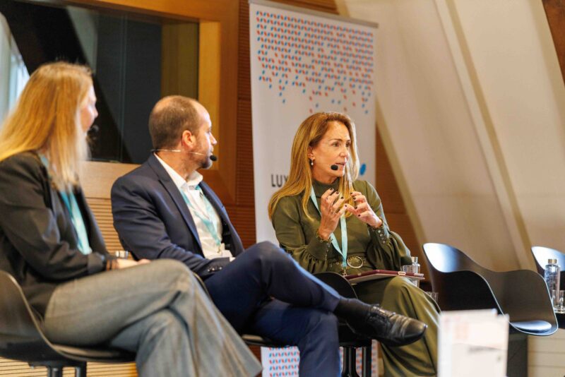 Woman speaking on conference panel