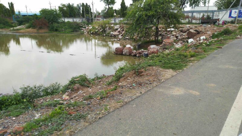 Waste by a river