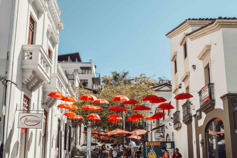 Puerto Vallarta lively street with buildings and umbrellas