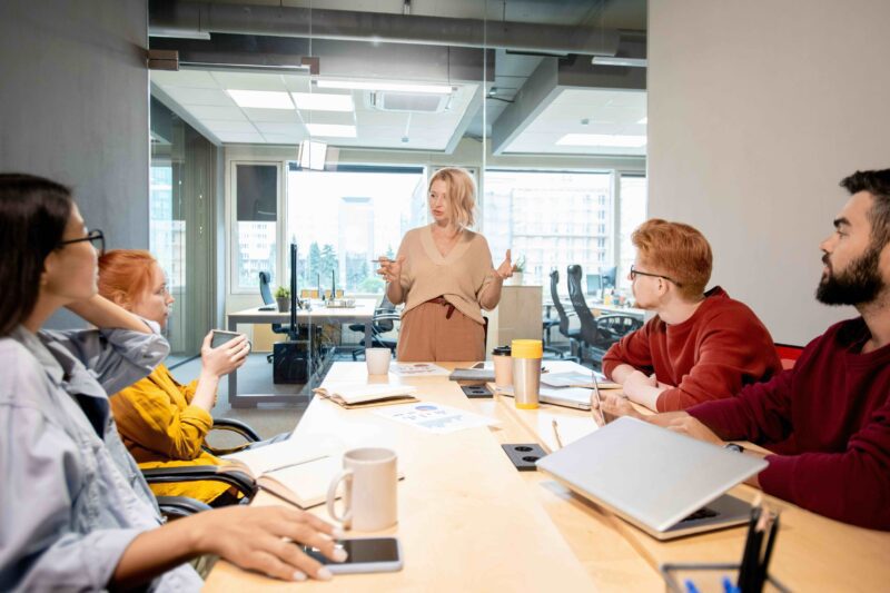 Management team in boardroom meeting